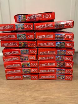 Lot of 16 Puzzlebug 500-Piece Jigsaw Puzzles