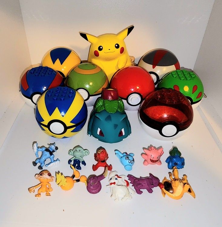 lot of Pokemon toys... multiple Pokemon balls, Fat Pikachu no tail, and  vintage 90s Squirting Bulbasaur