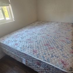 Queen size bed frame on wheels plus free queen size mattress