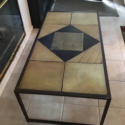 Coffee table with matching end tables. Metal and Slate. Attractive In their own right!