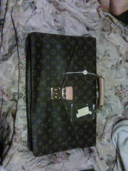 Louis Vuitton purse or laptop bag