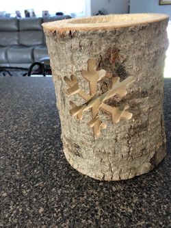 Tree trunk candle holder