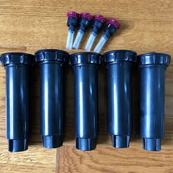 Rain Bird High-Efficiency Sprinklers + Nozzles (four sets, brand new)