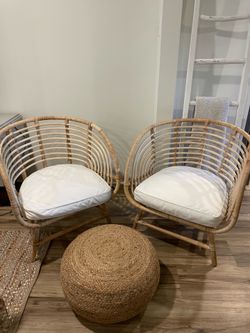 Rattan barrel chair with white cushion