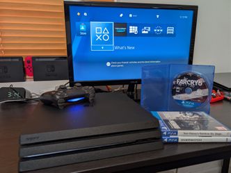 PlayStation 4 Pro with Controller and 3 Games