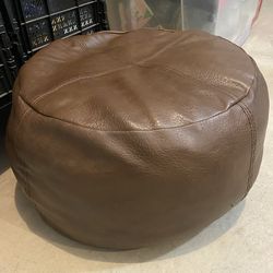 Faux leather ottoman or footstool