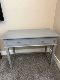 Grey wooden desk with one drawer