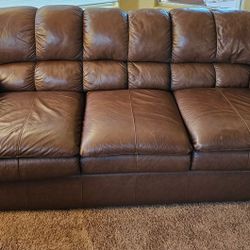 Leather Sofa Brown Color.7 Feet Long 3 Feet Tall