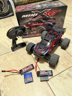 Traxxas XRT Mini with extra accessories.