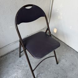 Set Of Four Brown Folding Chairs With Purple Cover