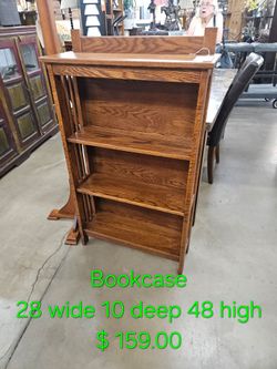 Bookcase Dark OakWe are located at 2811 East Bell road. Another Time Around Furniture.