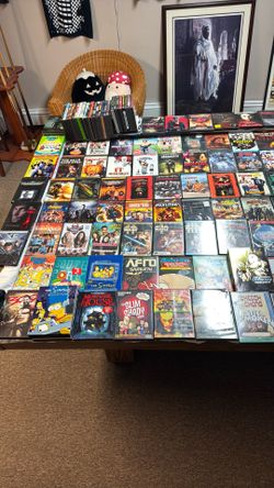 200  plus DVDs all good condition 4 TVs all have minor problems and tv table