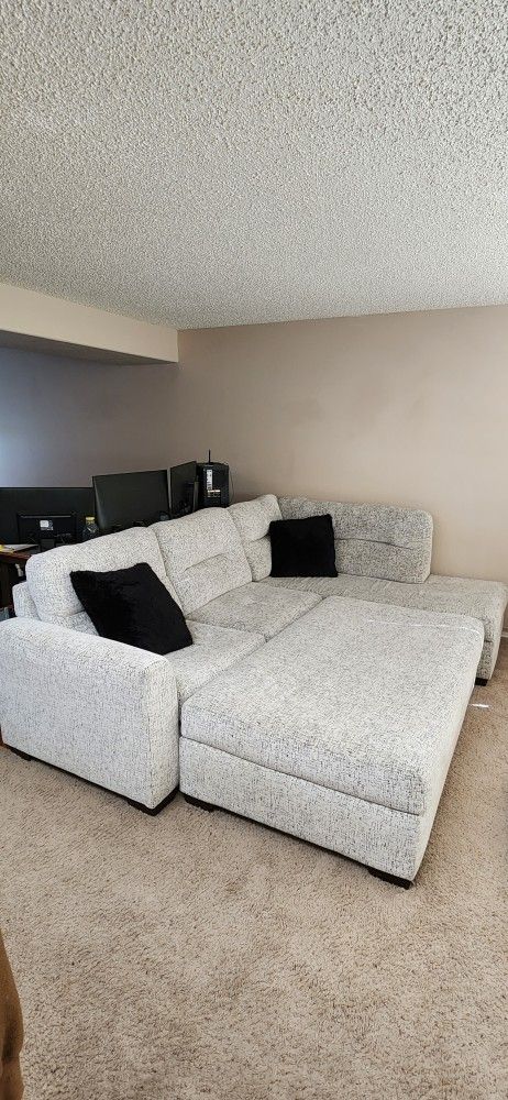 Large White Sectional Couch and Ottoman