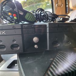 Original xbox system with controller and cords 
Cleaned tested and working perfectly in every way