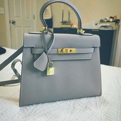 Hermes
Kelly Handbag Grey Togo with Gold Hardware 25
