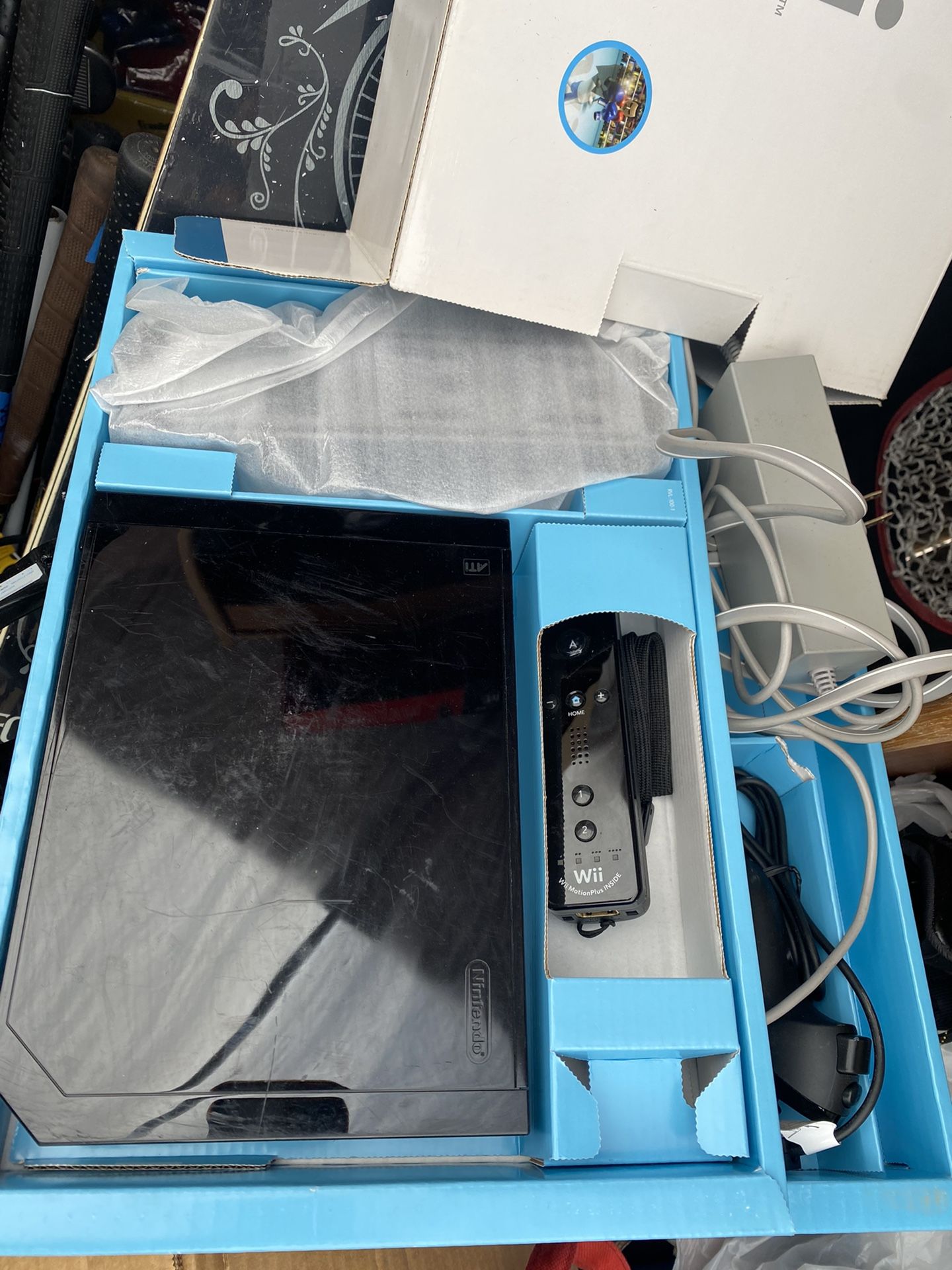 Black wii with oem nintendo remote, av component video cables