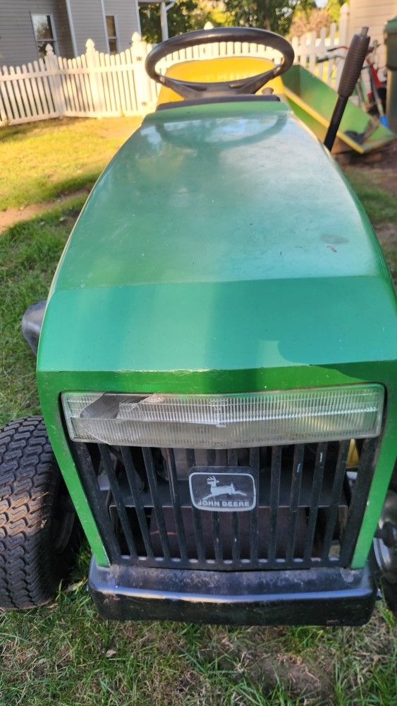 John deere  riding mower . runs and cuts great