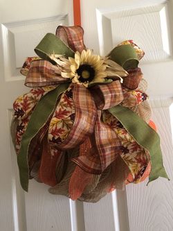 Pumpkins sunflower wreath with leaves and ribbon