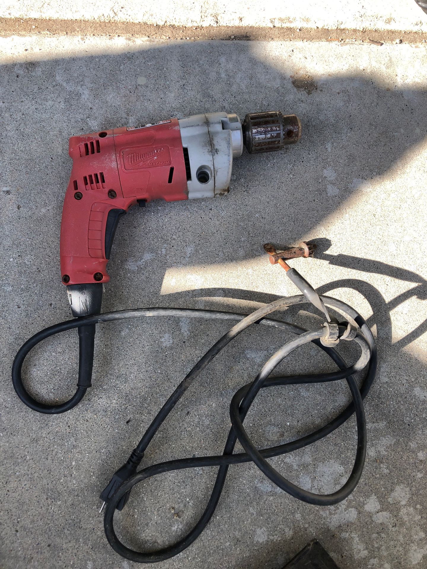 Milwaukee Drill with chord and chuck key