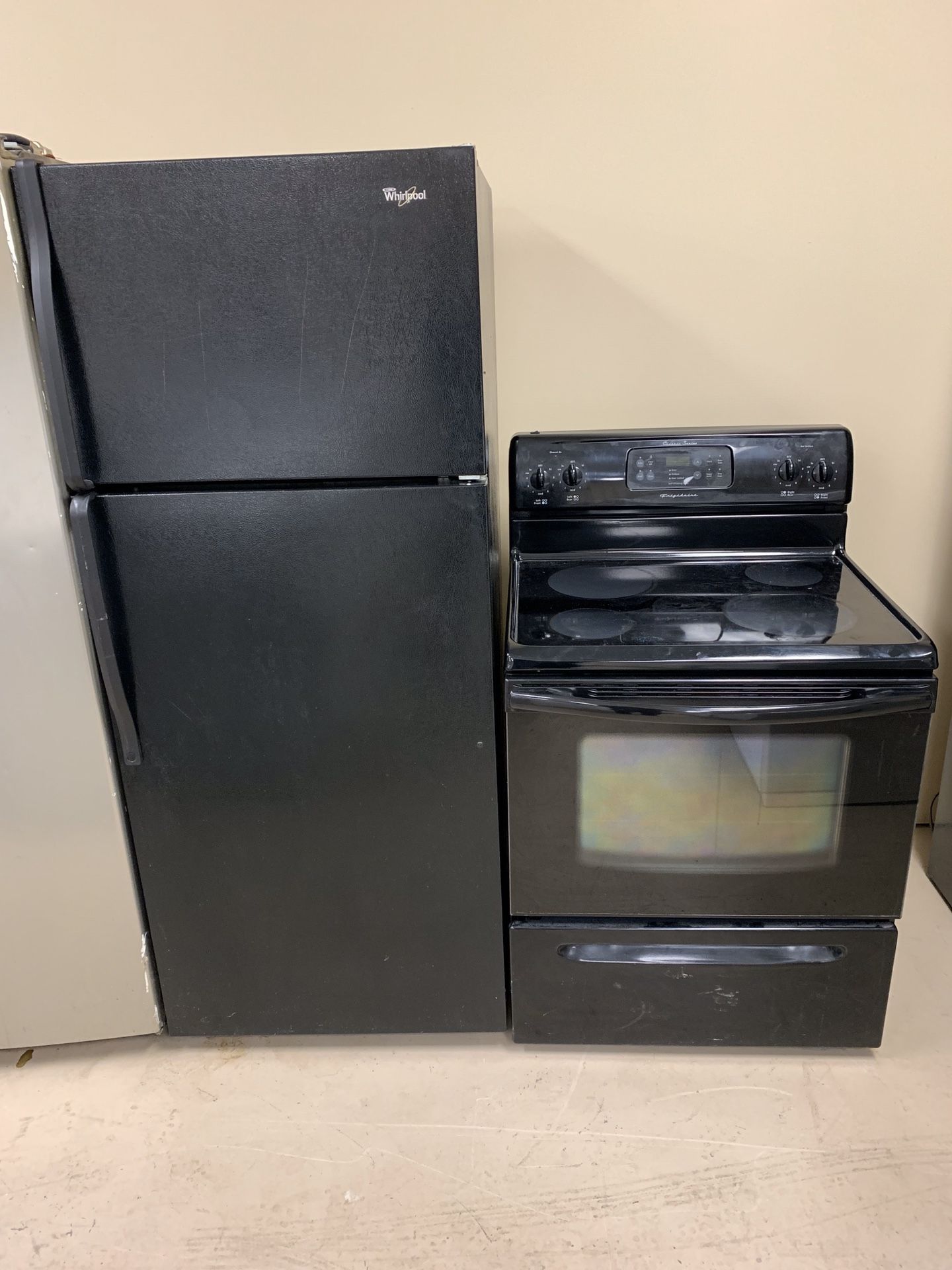 Black refrigerator and stove set