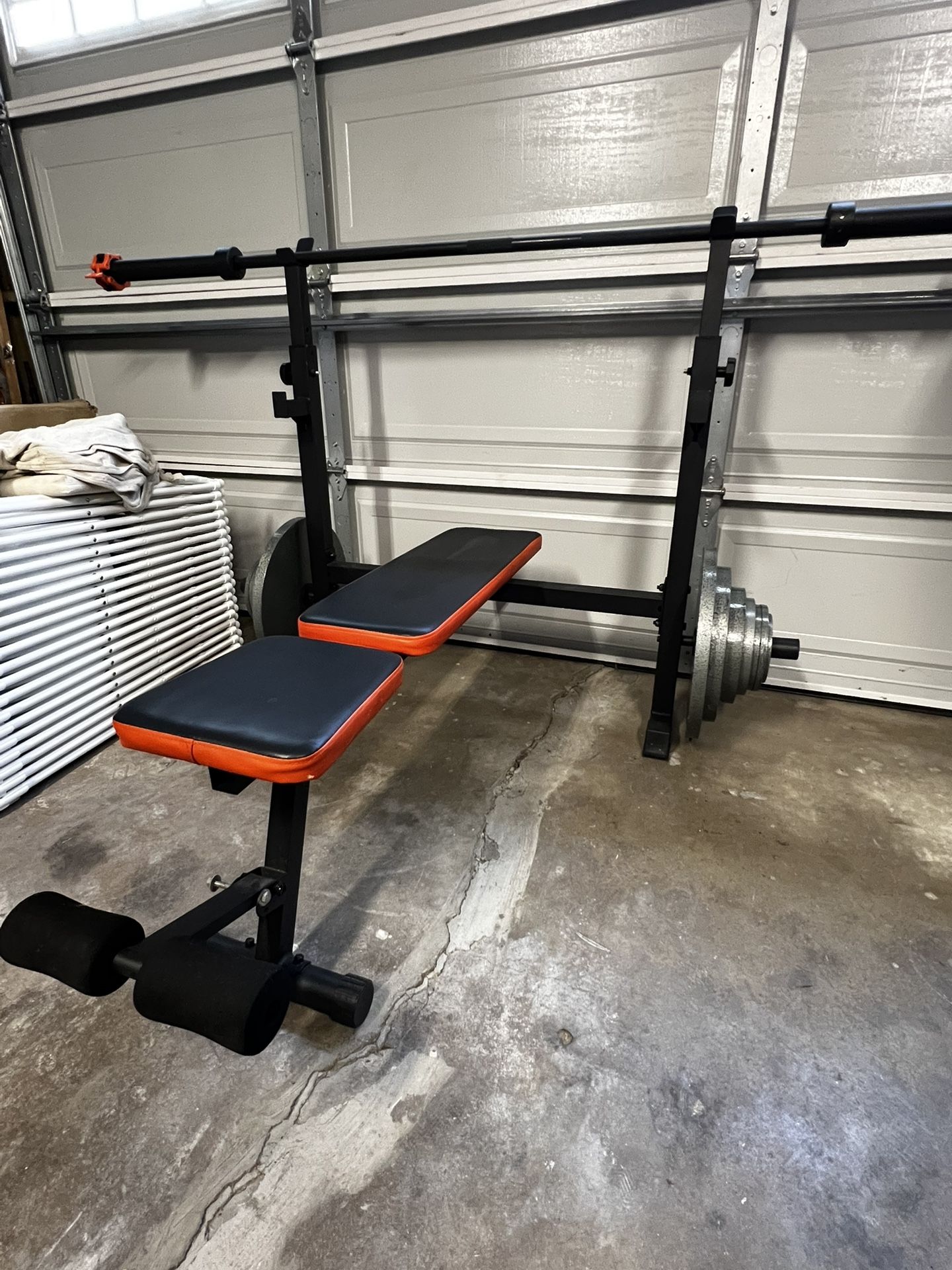 Adjustable Weight bench and Barbell plates