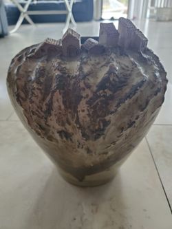 Heavy large glazed clay brown vase has small houses village on rim vase see 4 pictures