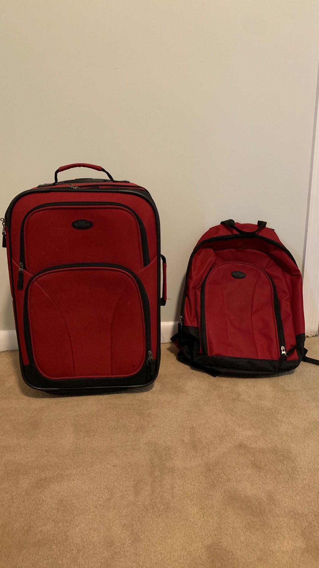 US traveler carry on roller bag and matching backpack