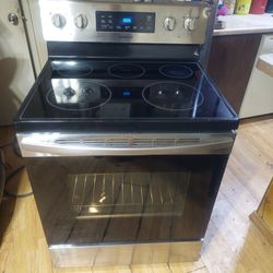 Nice Samsung 5 Burner glass top stove with Self Cleaning Oven