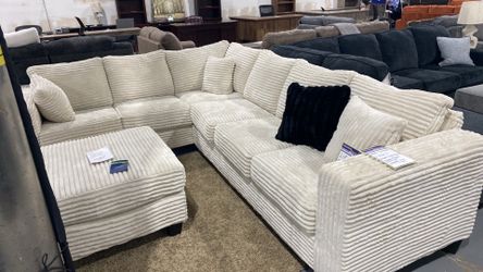 Fluffy cream colored sectional