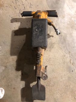 Atlas Copco jack hammer with bit