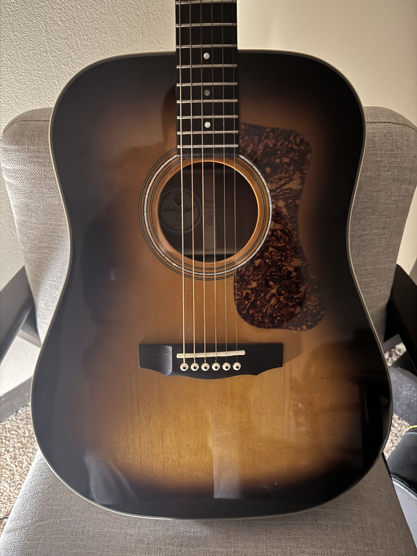 Guild Acoustic Guitar with Hard Shell Case.