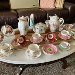 Assortment Of Antique And Collectible tea, cups, and saucers