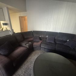 sectional reclining couch and ottoman.