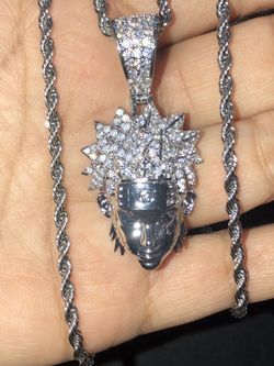 Brand new men’s iced out NARUTO pendant with stainless steel rope chain! Fully iced out ! Doesn’t Turn green