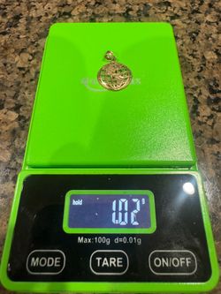 10k world pendant