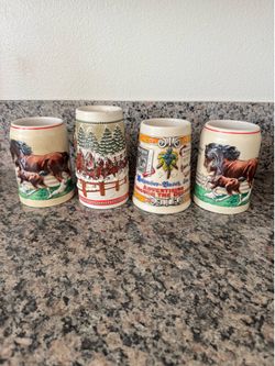 Lot of 4 Vintage Budweiser Beer Steins Holiday Clydesdales Ceramarte Collector Mugs 1980s