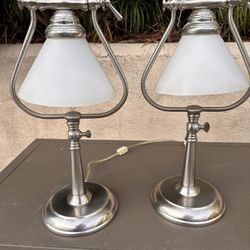 This is a pair of Ting Shen stainless steel heavy adjustable goose neck table desk lamps
