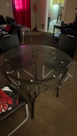 Glass table with chairs