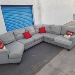 Gray sectional couch , very clean , delivery available,
