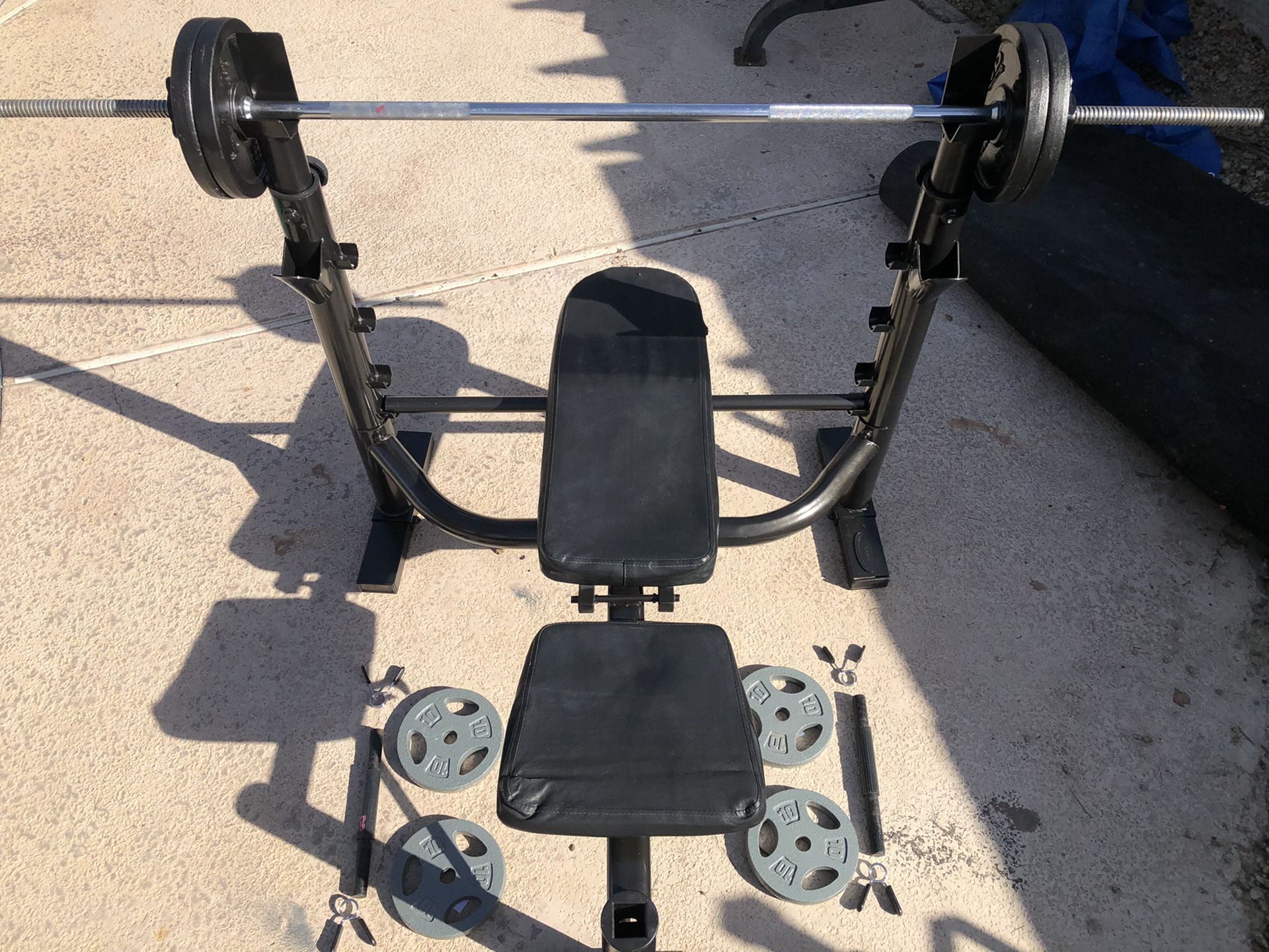 Adjustable workout bench press , With straight Bar & adjustable dumbbells with weight plates..$315 OBO