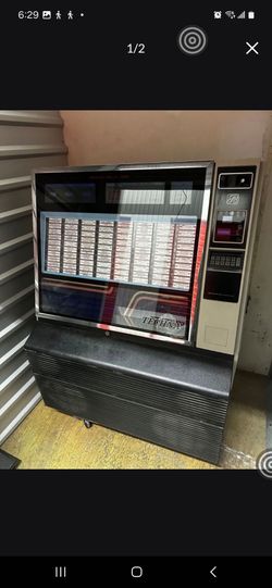 1980's Fully Restored Rock-Ola Model 480 techna jukebox It is a 45 RPM vinyl Record jukebox featuring a,distinct, boxy "Space age "