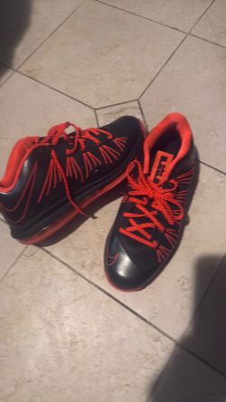 Max LeBron 10 Low "Black Total Crimson," released in 2013.