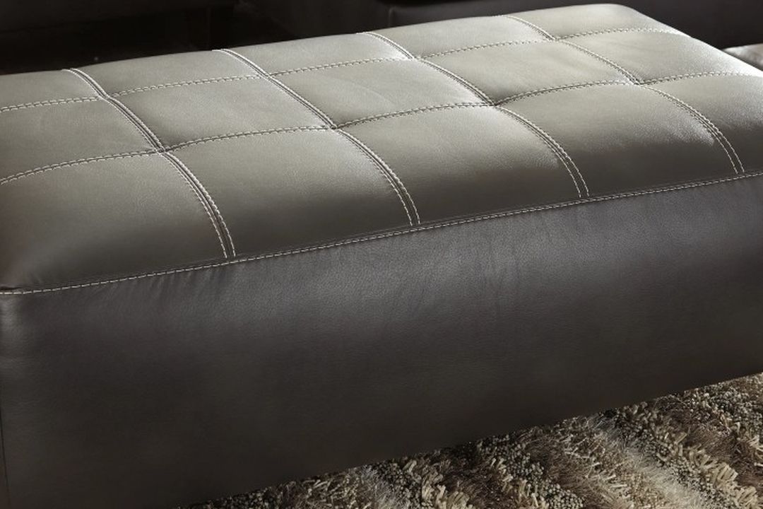 Nokomis - Charcoal - 5 Pc. - LAF Sofa, RAF Corner Chaise Sectional, Accent Ottoman, 2 Coylin End Tables