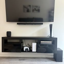 Full entertainment center (tv, sound bar, and stand)