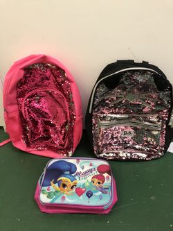 2 backpacks and lunch box