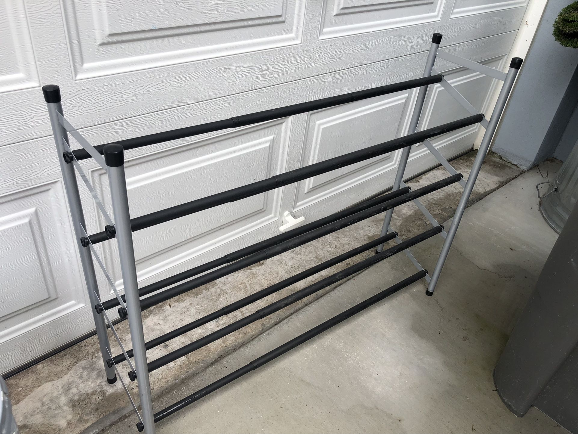  Expandable up to 3 feet shoe rack. Pick up in Jupiter.