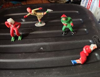Vintage Barclay skating figurines x4