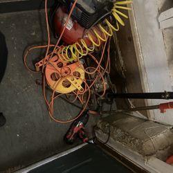 Air compressor hydraulic jack compactor