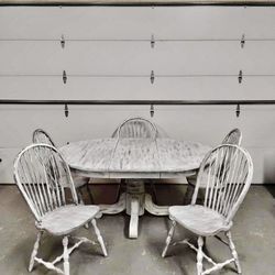 Rustic six-piece dining set in good pre-owned condition. Table dimensions: Height 30", Width 48", Length 65".   Chair height 18".