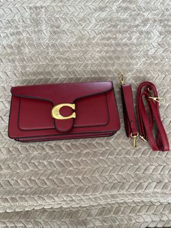 Coach red leather clutch bag
